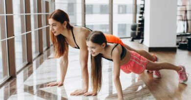 Mother and Daughter Doing Pushups